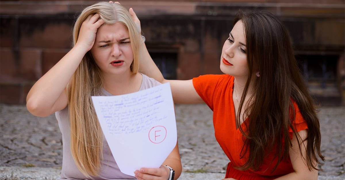 Student girl with low academic performance has received bad mark for examination, got F grade, failed test Frustrated woman receiving bad grade from stern friend outside school environment.