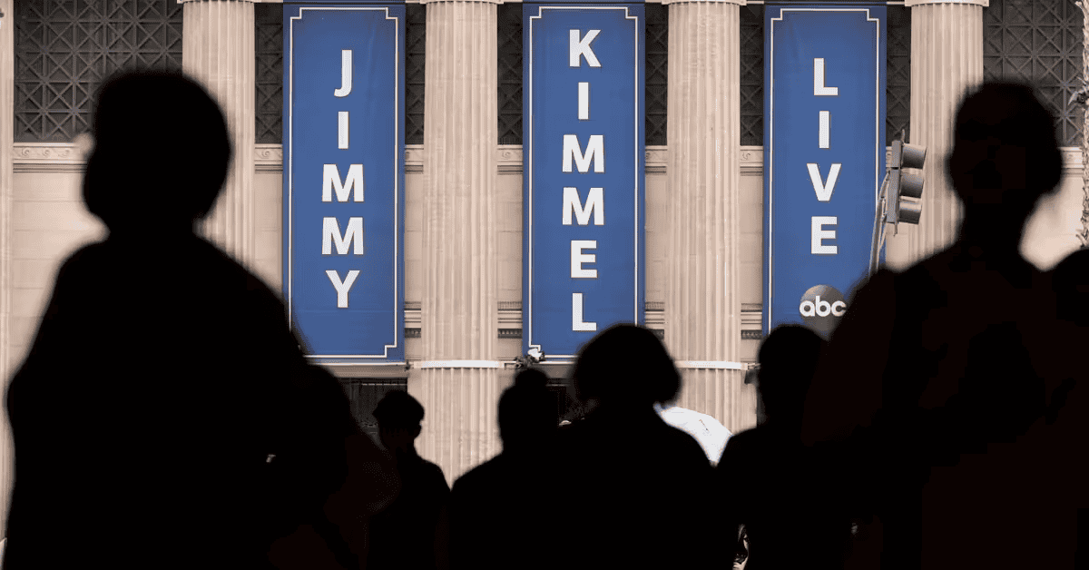 Jimmy kimmel live show banners on the building, silhouette audience in foreground, late-night entertainment, popular television comedy, America Out Loud news image relevance.
