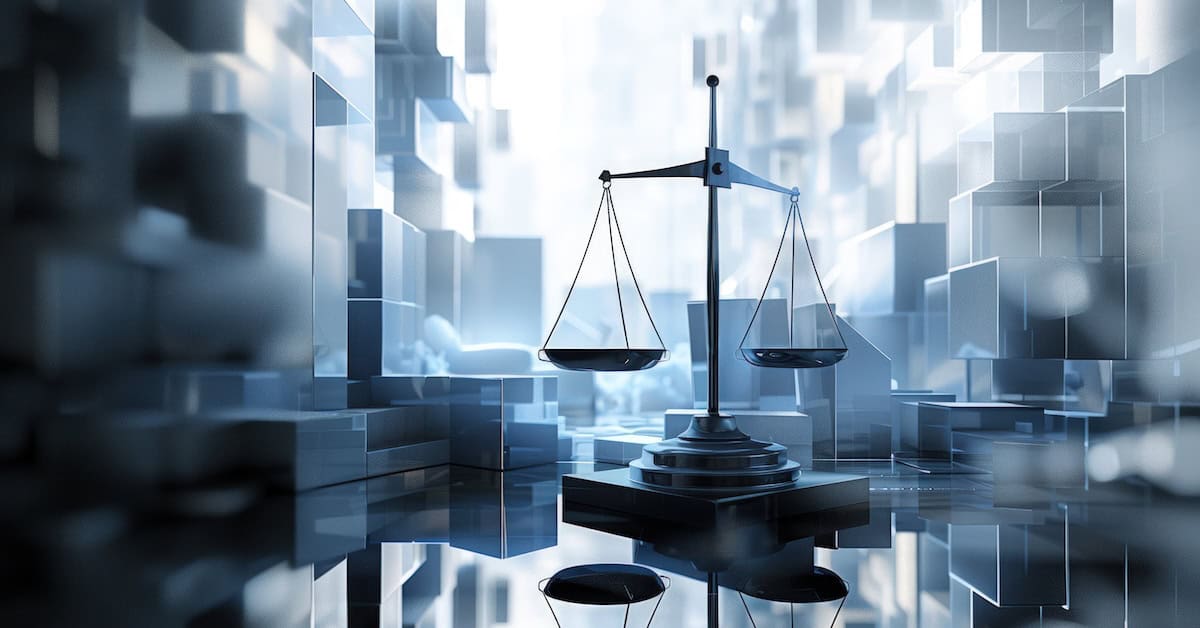 a law scale, court computer and laptop