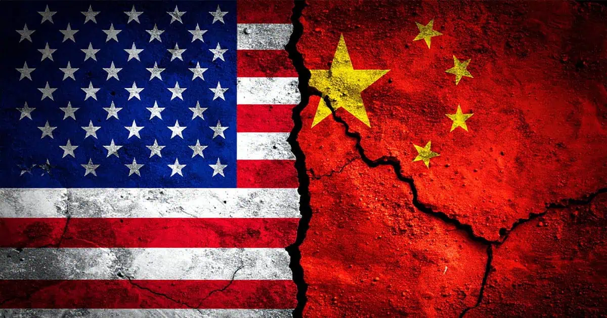 Cracked vertical split between US and China flags