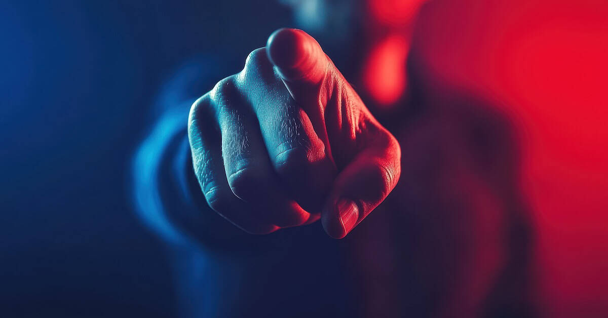 Finger pointing, closeup, red and blue light background, USA election