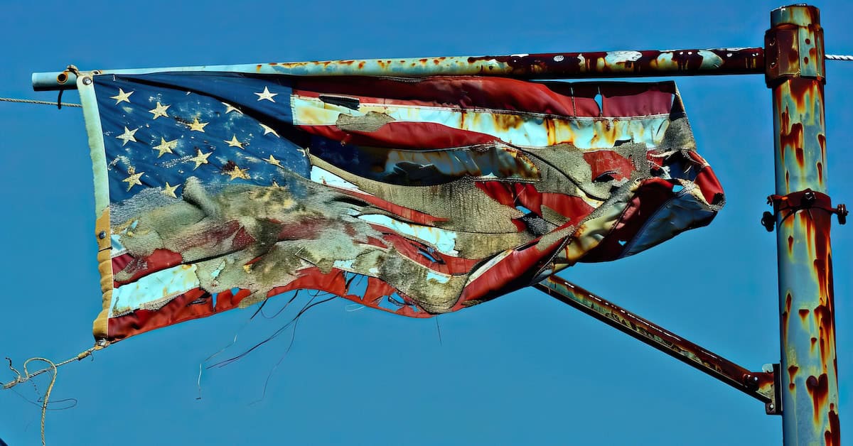 Decaying Edifice of Empire: A crumbling American flag, frayed at the edges, hanging from a rusted metal pole.