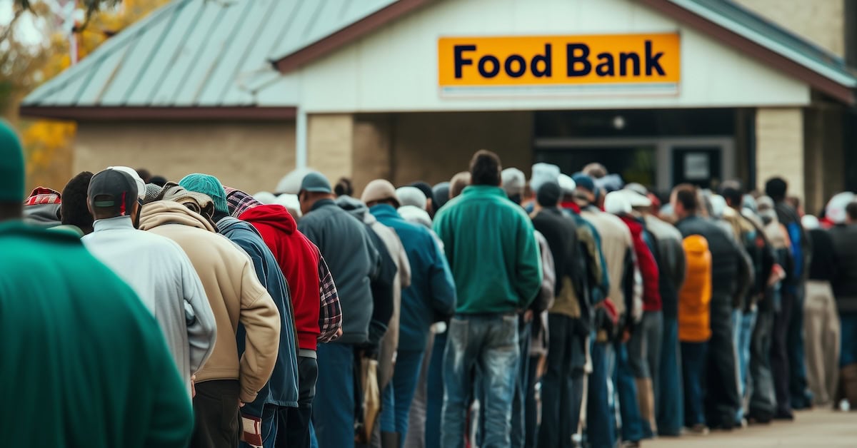 People stand in line outside a food bank, highlighting community need and support.