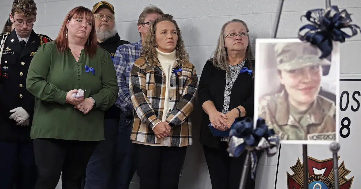 People gather for a vigil in honor of National Guard member Specialist Sarah Beckstrom, one of two National Guard members who were shot in Washington